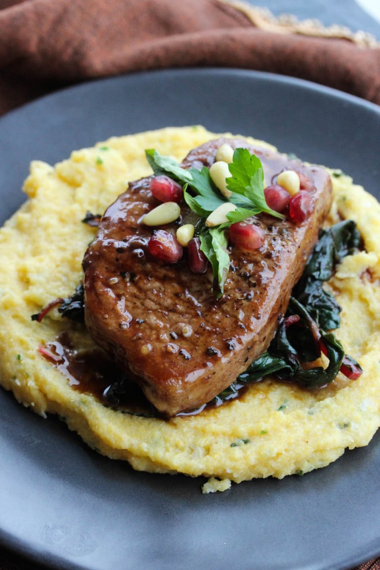 Balsamic Glazed Pork with Roasted Garlic Herb Polenta and Greens
