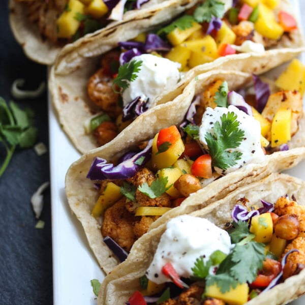 Chili Cauliflower Chickpea Tacos with Mango Salsa | dishingouthealth.com