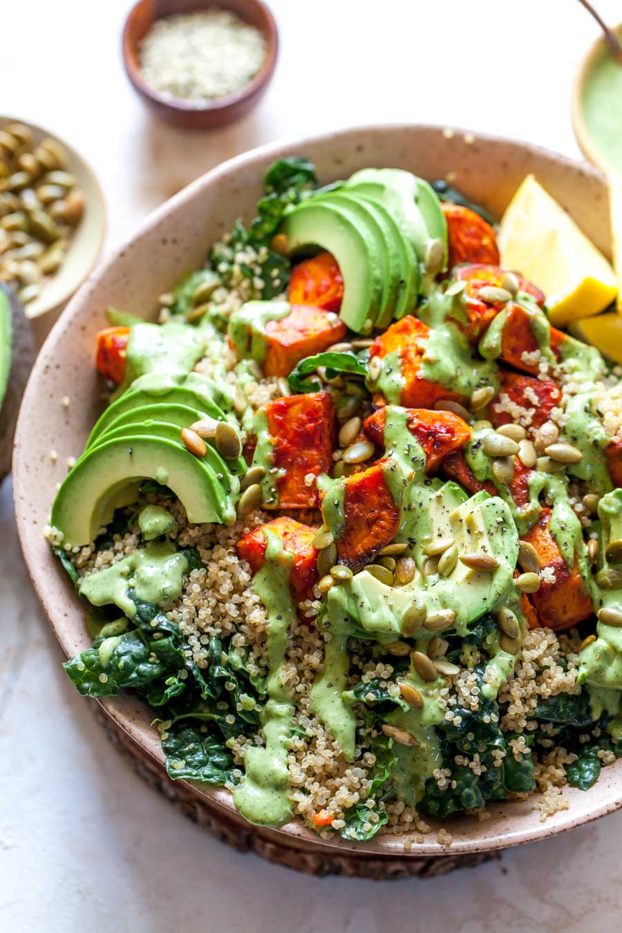 Roast potatoes with green sauce and tahini