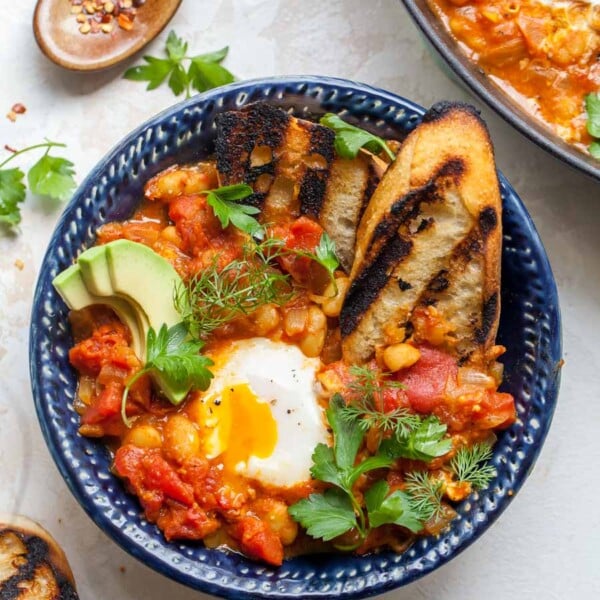 Poached Eggs in Curried Tomato Sauce with Beans