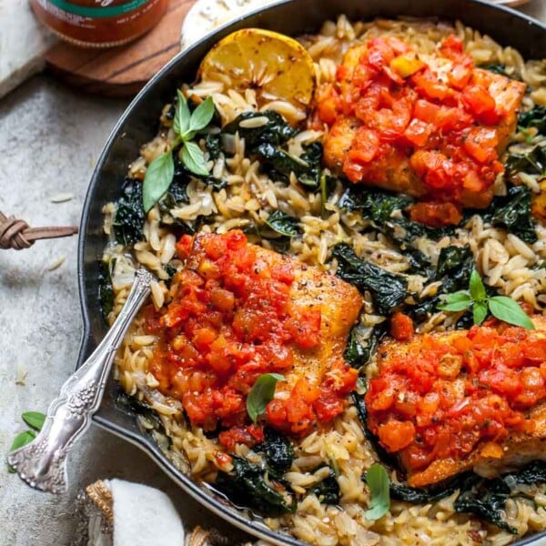 Salmon and orzo topped with tomato bruschetta