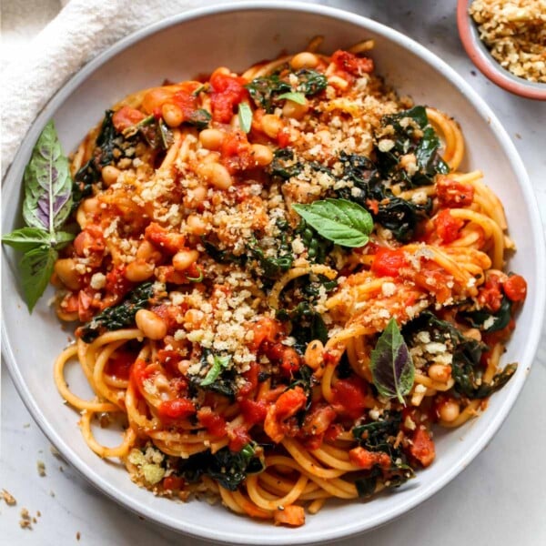 Spaghetti Pomodoro with kale, white beans, and garlicky breadcrumbs