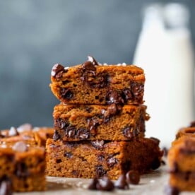 Chocolate chip pumpkin bars stacked on top of one another