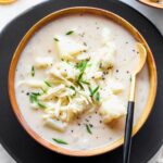 Cheddar Cauliflower Potato Soup topped with chives