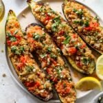 Quinoa Stuffed Zucchini with Harissa Butter