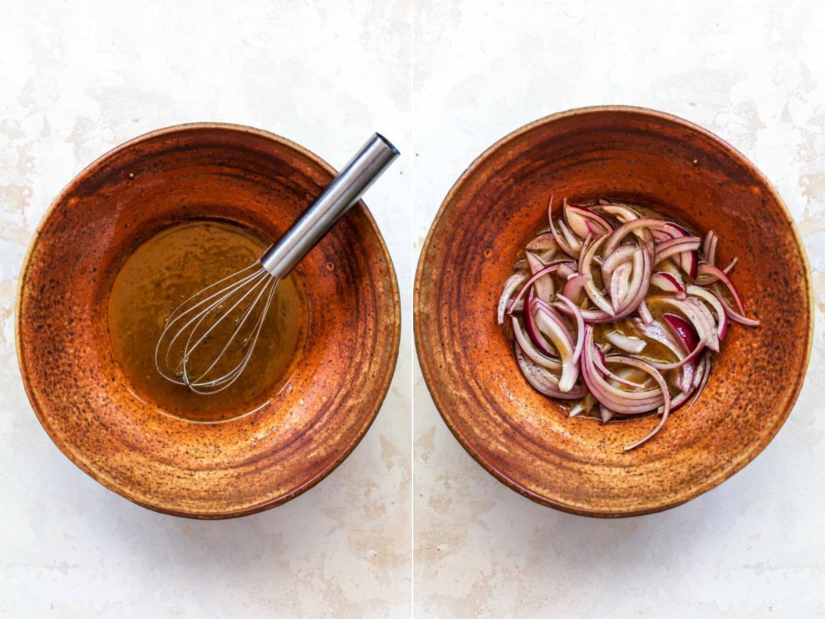 Red onion slices soaking in a red wine vinaigrette dressing in a large brown bowl.
