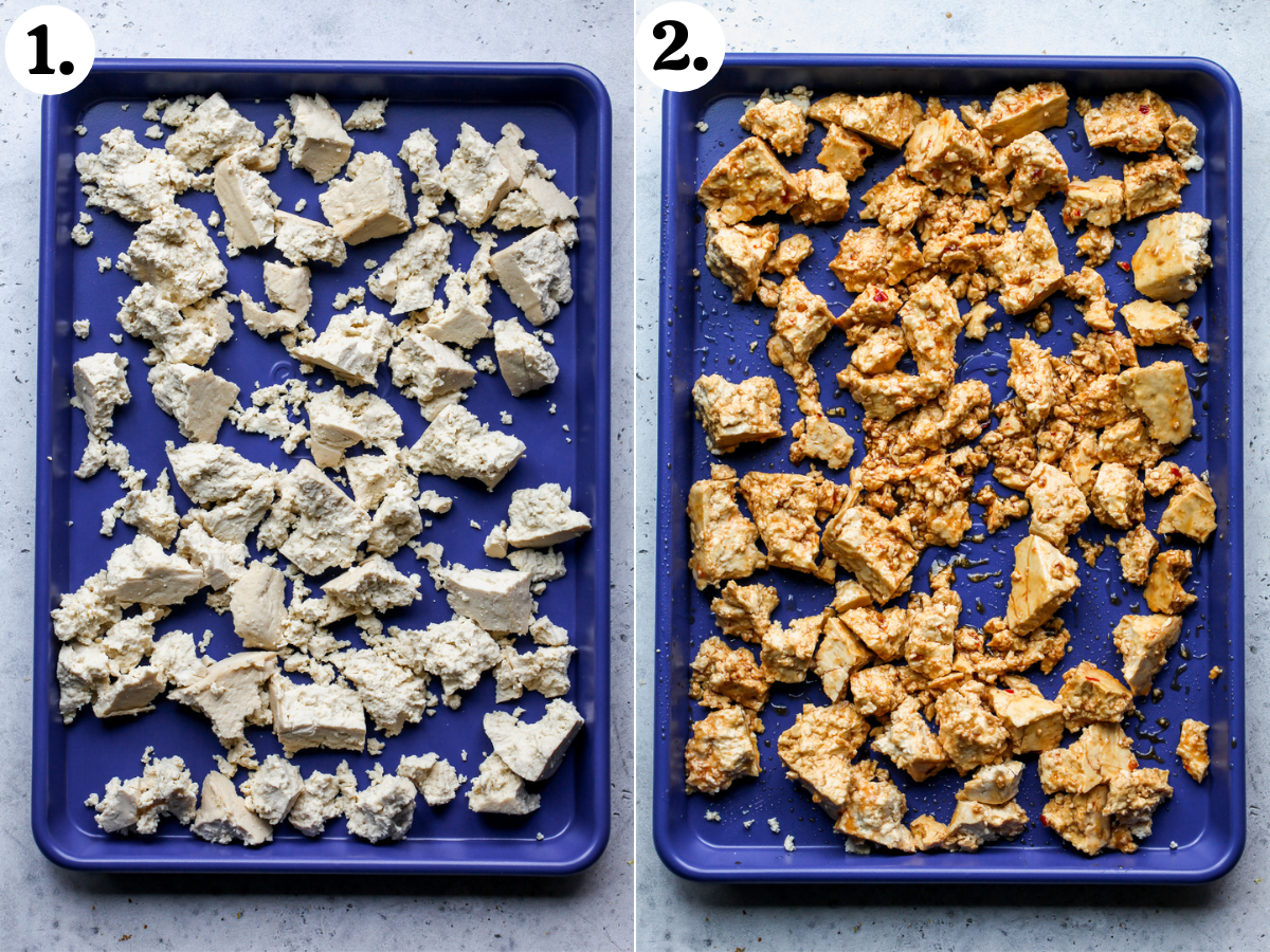 Torn pieces of tofu arranged on a blue baking sheet tossed in sweet chili sauce before roasting.