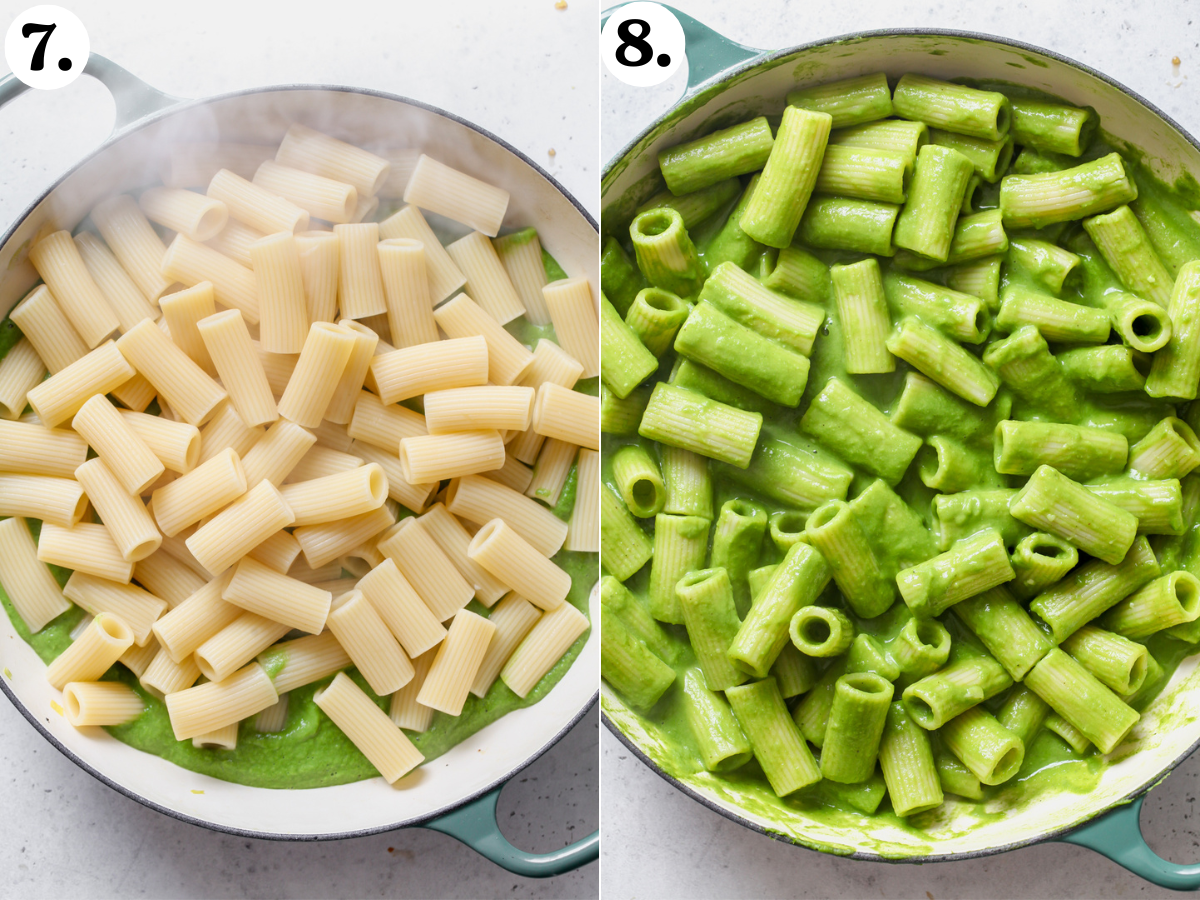 Cooked rigatoni being added to a pot of blended green sauce.