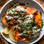 Roasted Sweet Potatoes with Harissa Lentils and Lemony Tahini